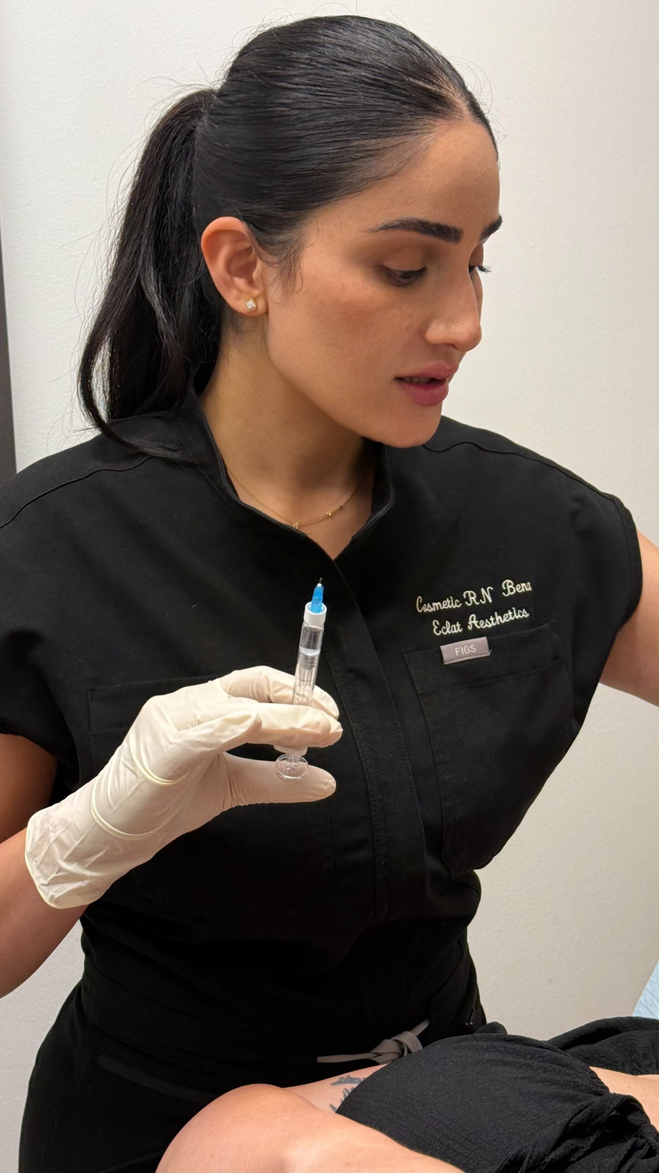 Bena performing a cosmetic treatment